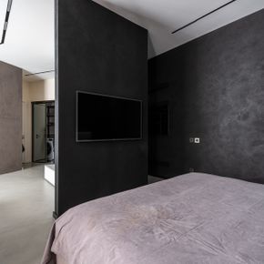 Wände in einem Loft bekommen durch Spachteltechnik Betonoptik